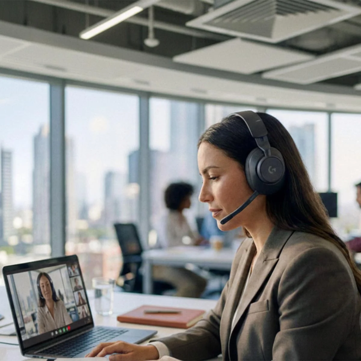 Professional woman wearing Logitech headset